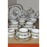 A COALPORT 'MING ROSE' PATTERN TEA SET, comprising teapot, cake plate, covered sugar bowl, footed