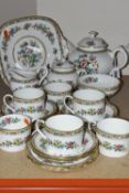 A COALPORT 'MING ROSE' PATTERN TEA SET, comprising teapot, cake plate, covered sugar bowl, footed