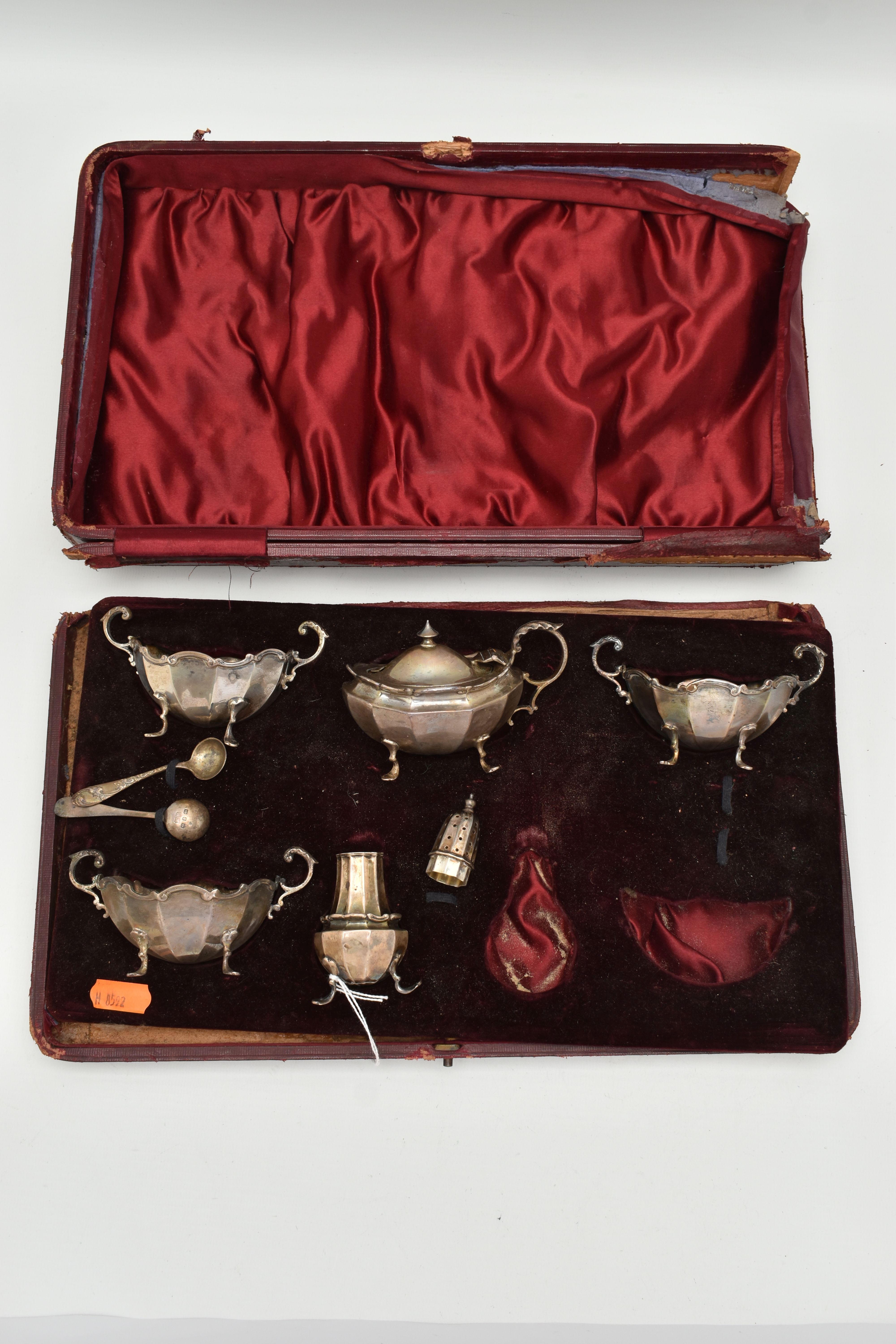 AN INCOMPLETE CASED SILVER CRUET SET, including three salts, hallmarks for Chester and Birmingham, a