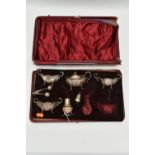 AN INCOMPLETE CASED SILVER CRUET SET, including three salts, hallmarks for Chester and Birmingham, a