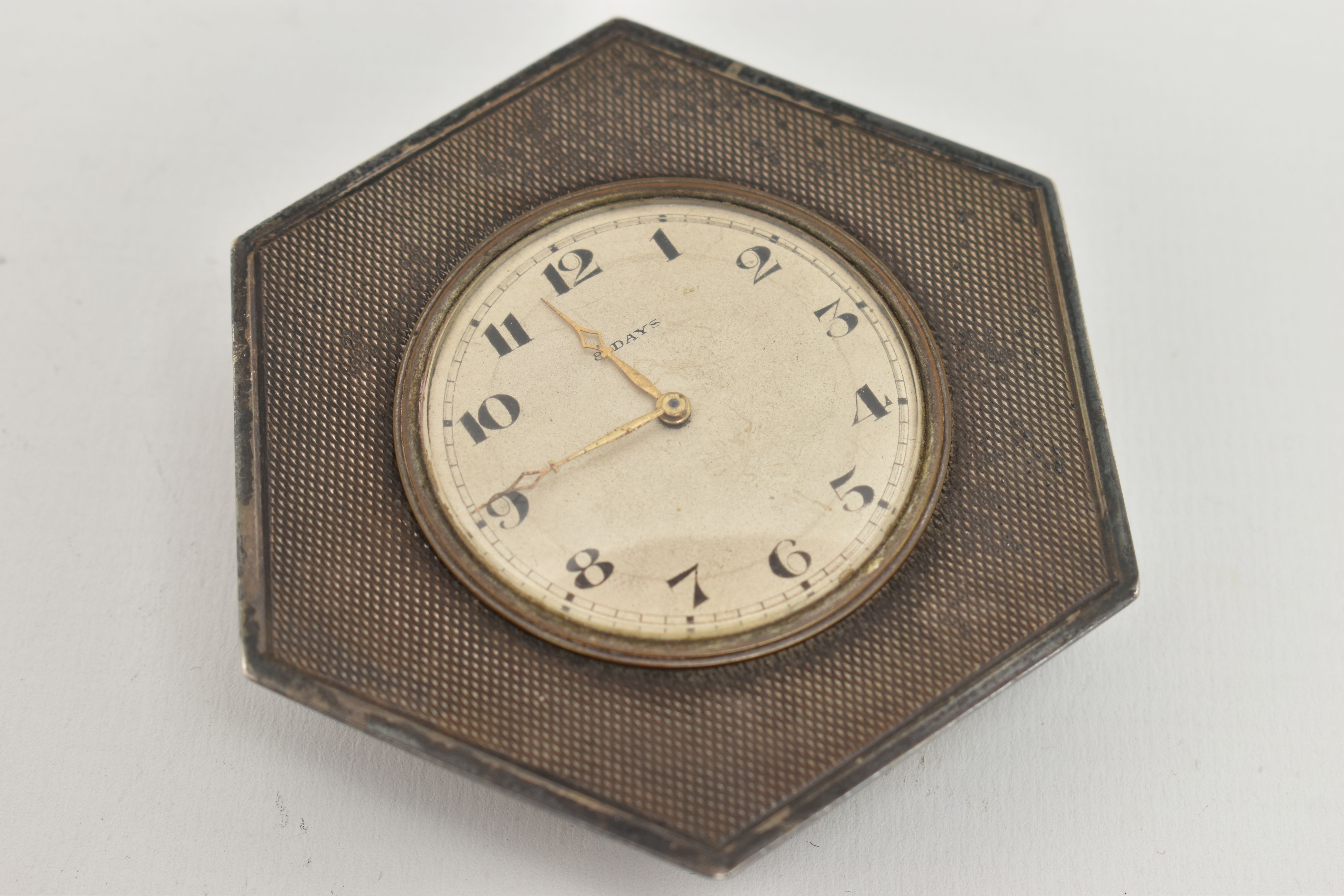 A SILVER 8 DAY BEDSIDE TABLE CLOCK, hexagonal form, engine turned pattern, with a round silvered - Image 4 of 4