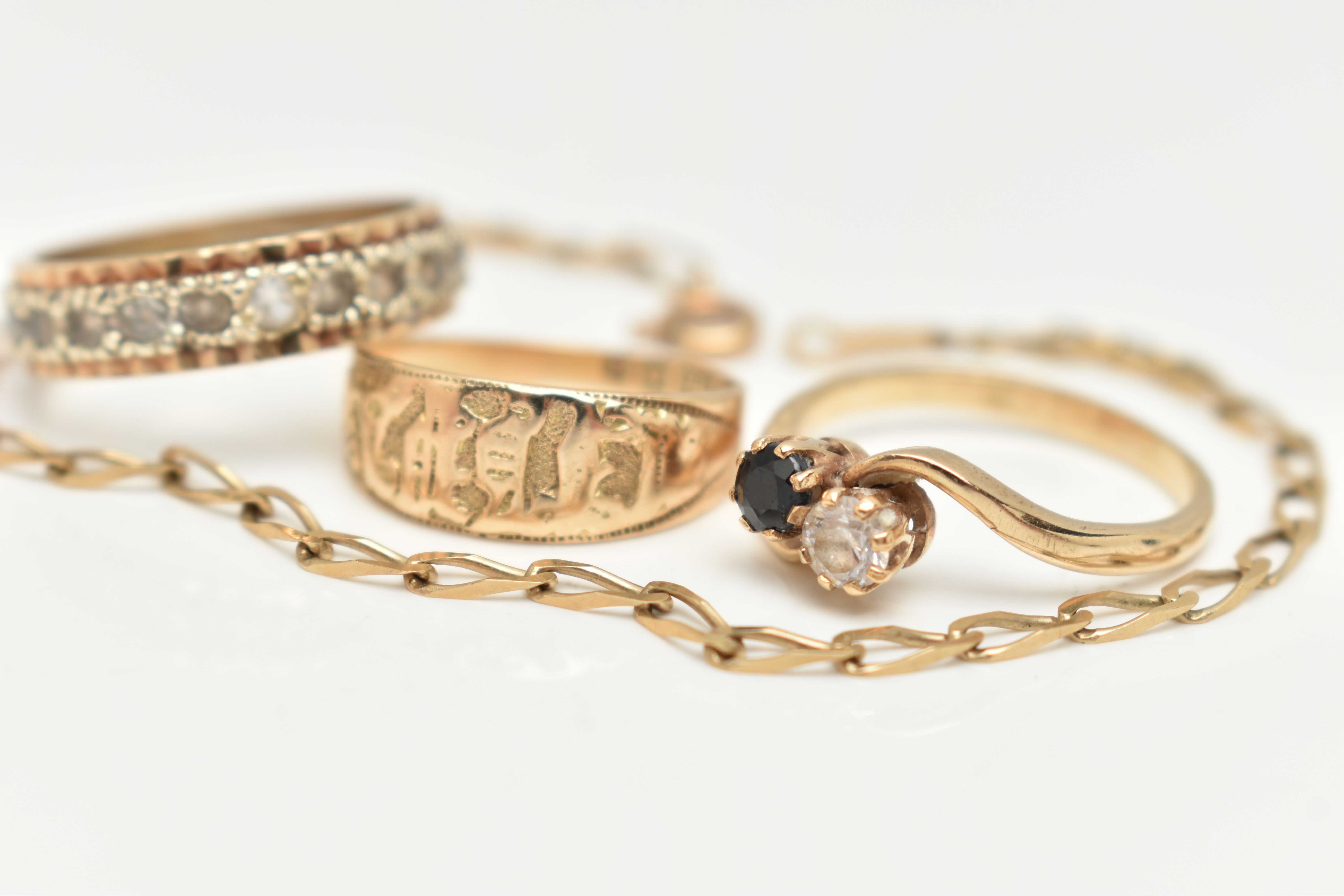 A 9CT GOLD BRACELET AND THREE RINGS, a yellow gold elongated curb link bracelet, fitted with a - Image 4 of 5