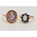 TWO GEM SET RINGS, the first an oval opal set with a surround of circular cut sapphires, prong set