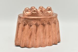 AN EARLY 20TH CENTURY COPPER JELLY MOULD OF OVAL FORM, stamped 'CM 205 1/2' to one side and '2' to