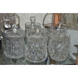 A GROUP OF EIGHT CUT GLASS BISCUIT BARRELS/JARS, two have silverplate lids and handles, some jars