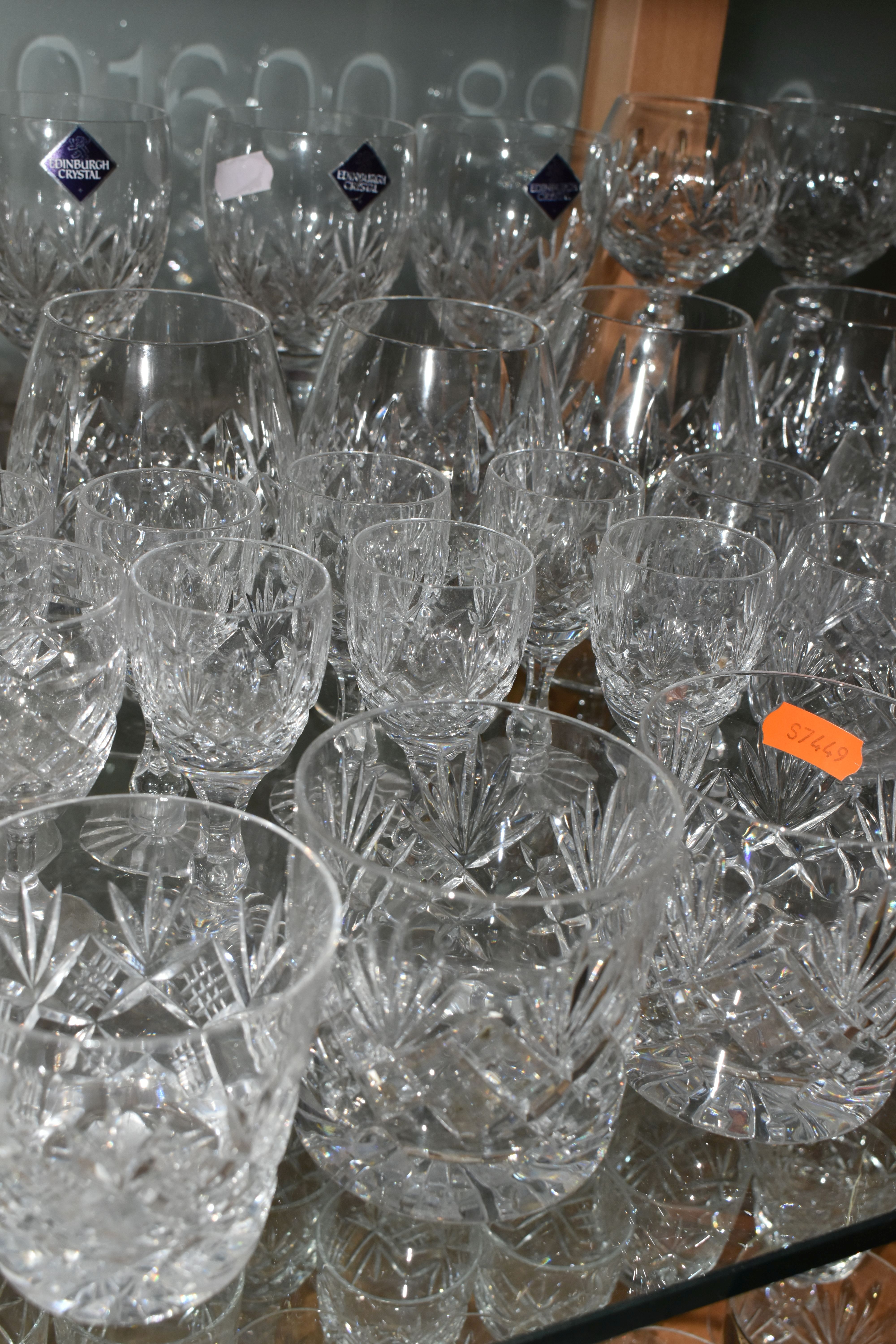 A LARGE QUANTITY OF ASSORTED CUT CRYSTAL DRINKING GLASSES, comprising Tutbury Crystal whisky - Image 8 of 10