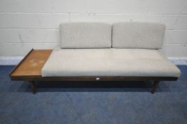 IN THE MANNER OF INGMAR RELLING FOR EKORNES, A NORWEGIAN MID CENTURY TEAK DAYBED, with beige