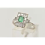 A WHITE METAL EMERALD AND DIAMOND RING, Art Deco style, the centre set with an emerald cut emerald