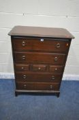 A STAG MINSTREL CHEST OF SEVEN DRAWERS, width 82cm x depth 47cm x height 113cm (condition report: