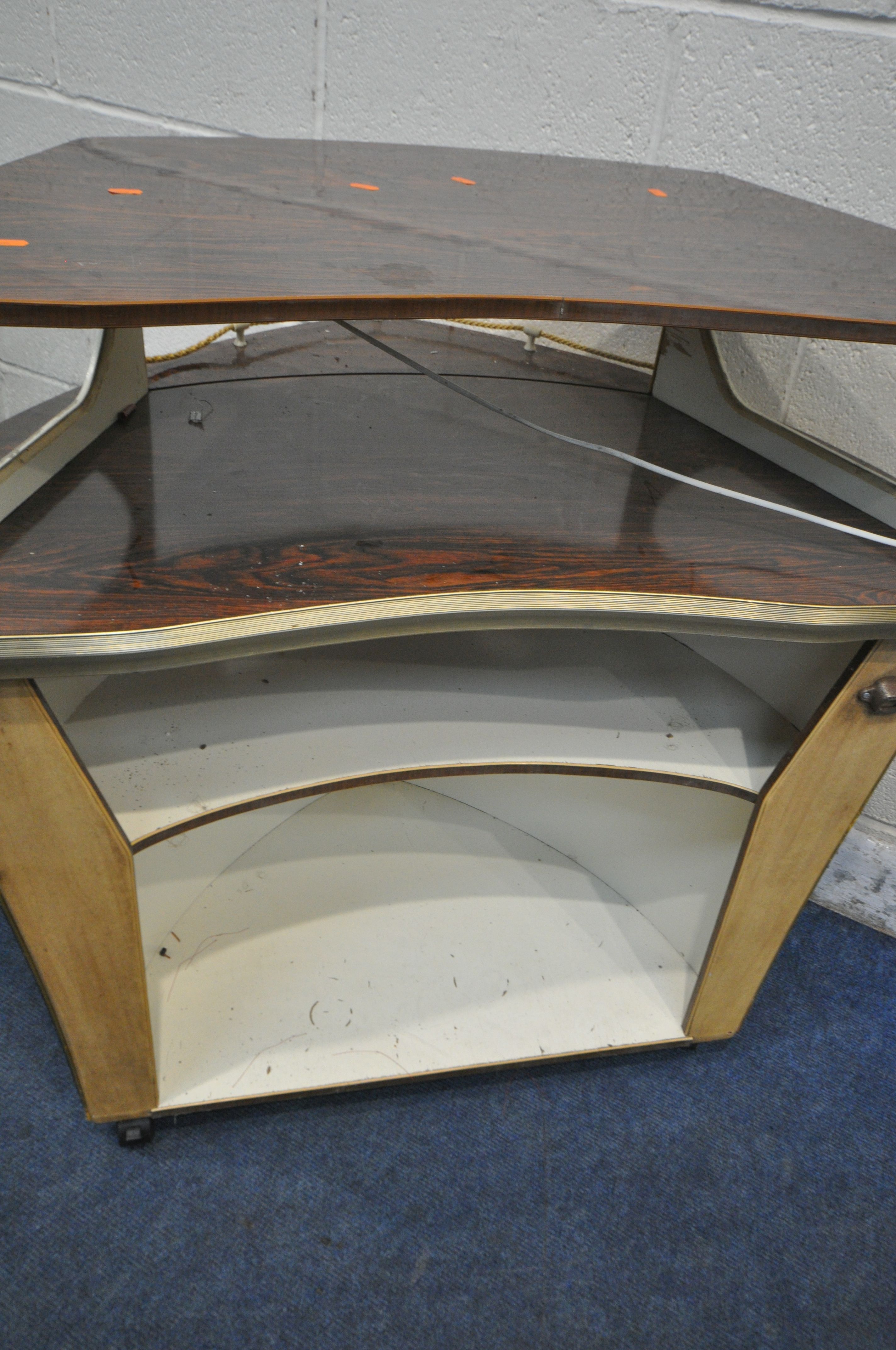 A MID CENTURY COCKTAIL BAR, designed in the shape of a boat front, with simulated rosewood top, - Image 6 of 6