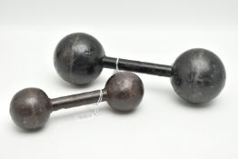 TWO VINTAGE CAST METAL DUMBELLS WITH SPHERICAL ENDS, the larger bears an impressed '6', the