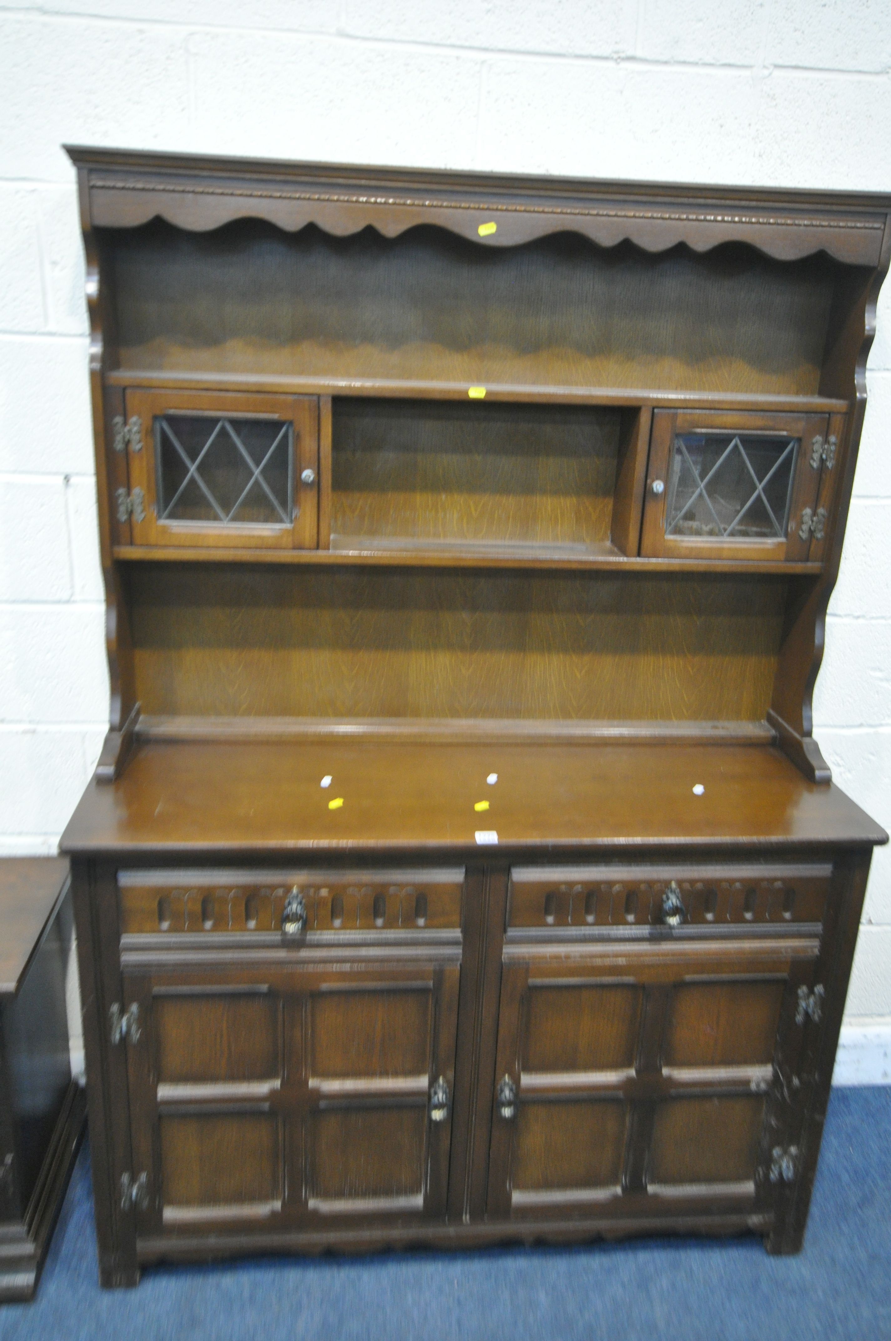 A GRANGEMOOR OAK DRESSER, fitted with two lead glazed doors, a two tier plate rack, atop a base with - Image 2 of 5