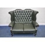 A QUEEN ANNE STYLE GREEN LEATHER UPHOLSTERED WINGBACK TWO SEATER SOFA, length 132cm x depth 88cm x