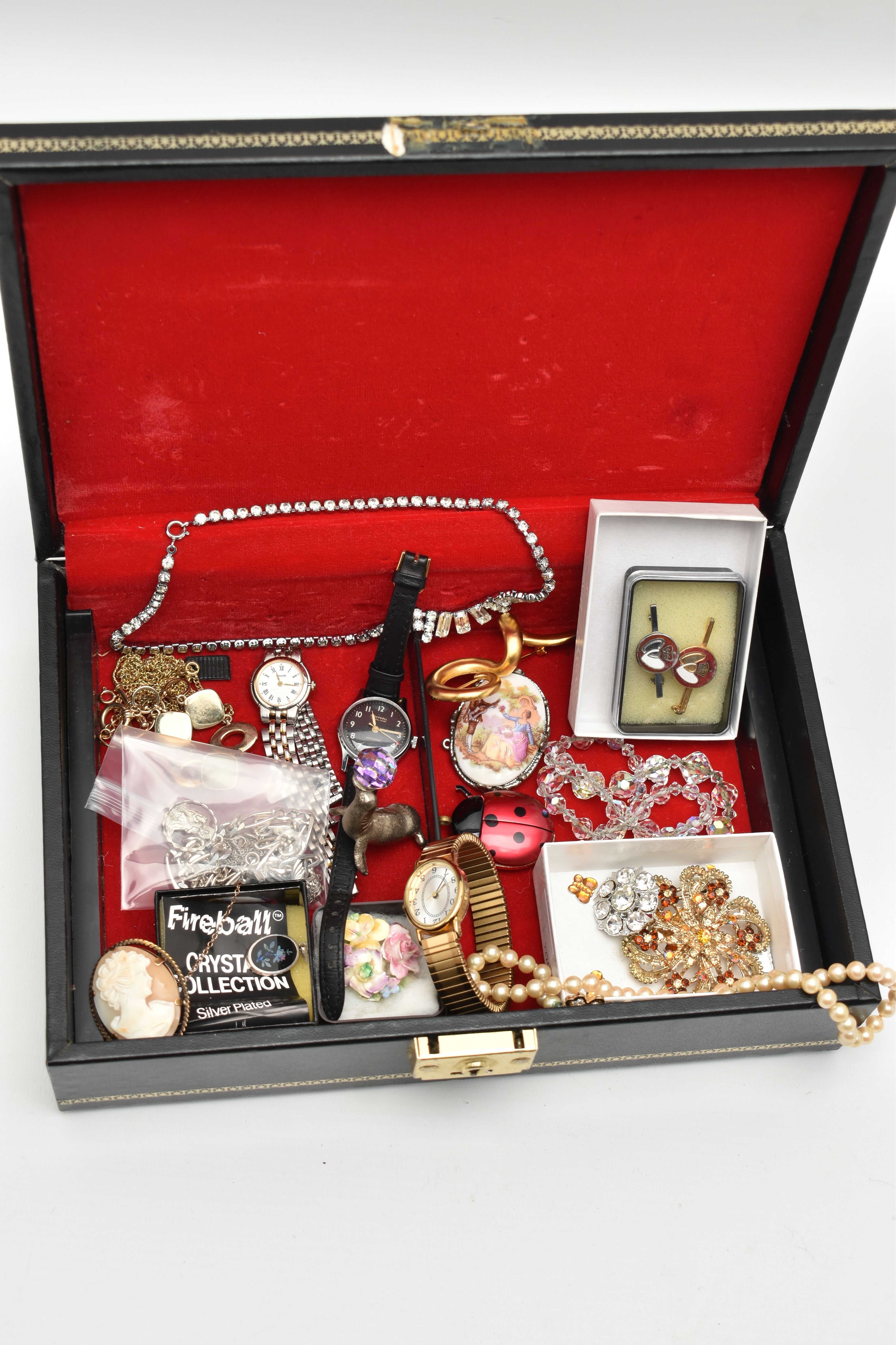 A JEWELLERY BOX AND COSTUME JEWELLERY, a black rectangular form jewellery box with hinged lid,