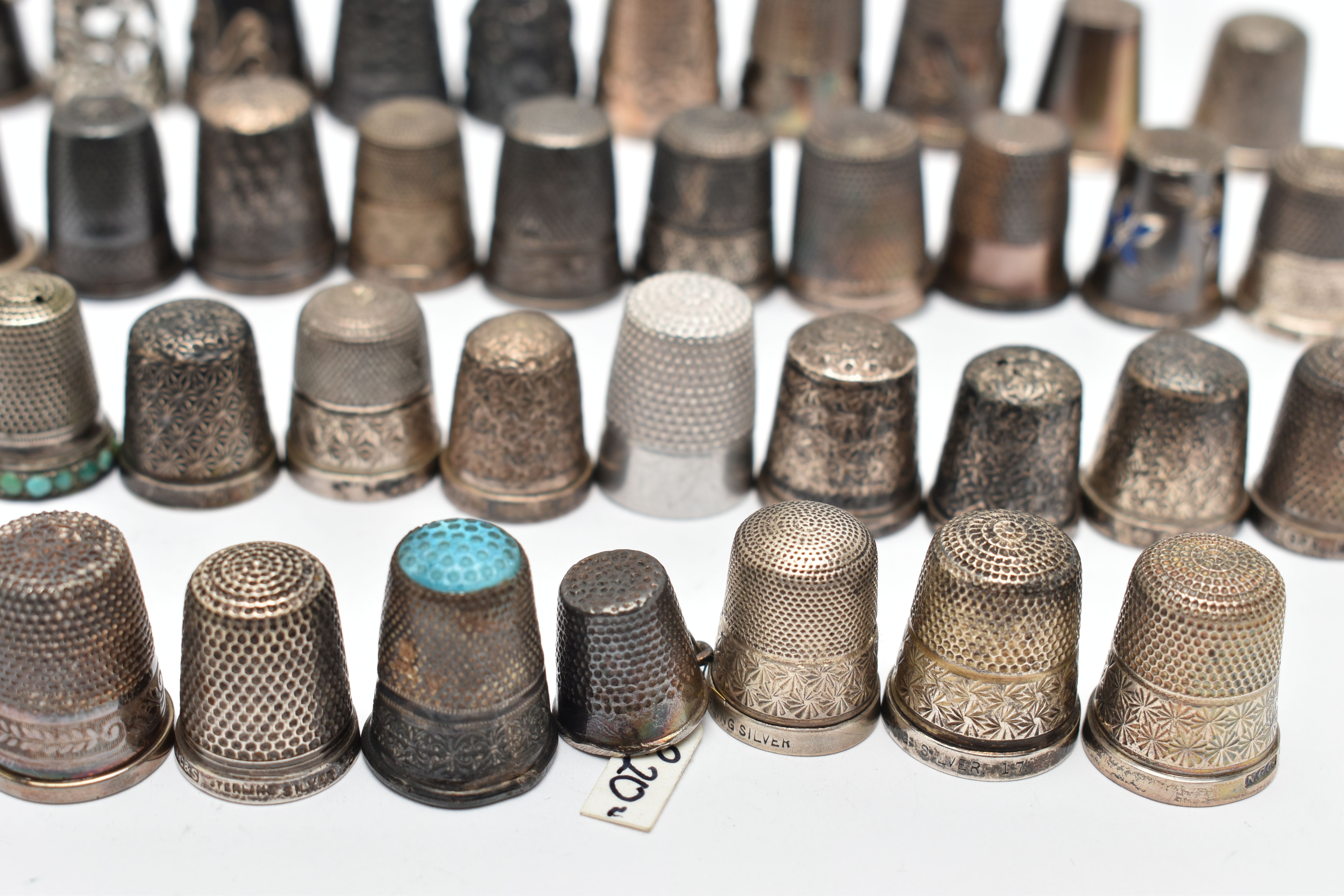 A BAG OF WHITE METAL THIMBLES, various designs and patterns, some set with semi-precious stone - Image 3 of 10