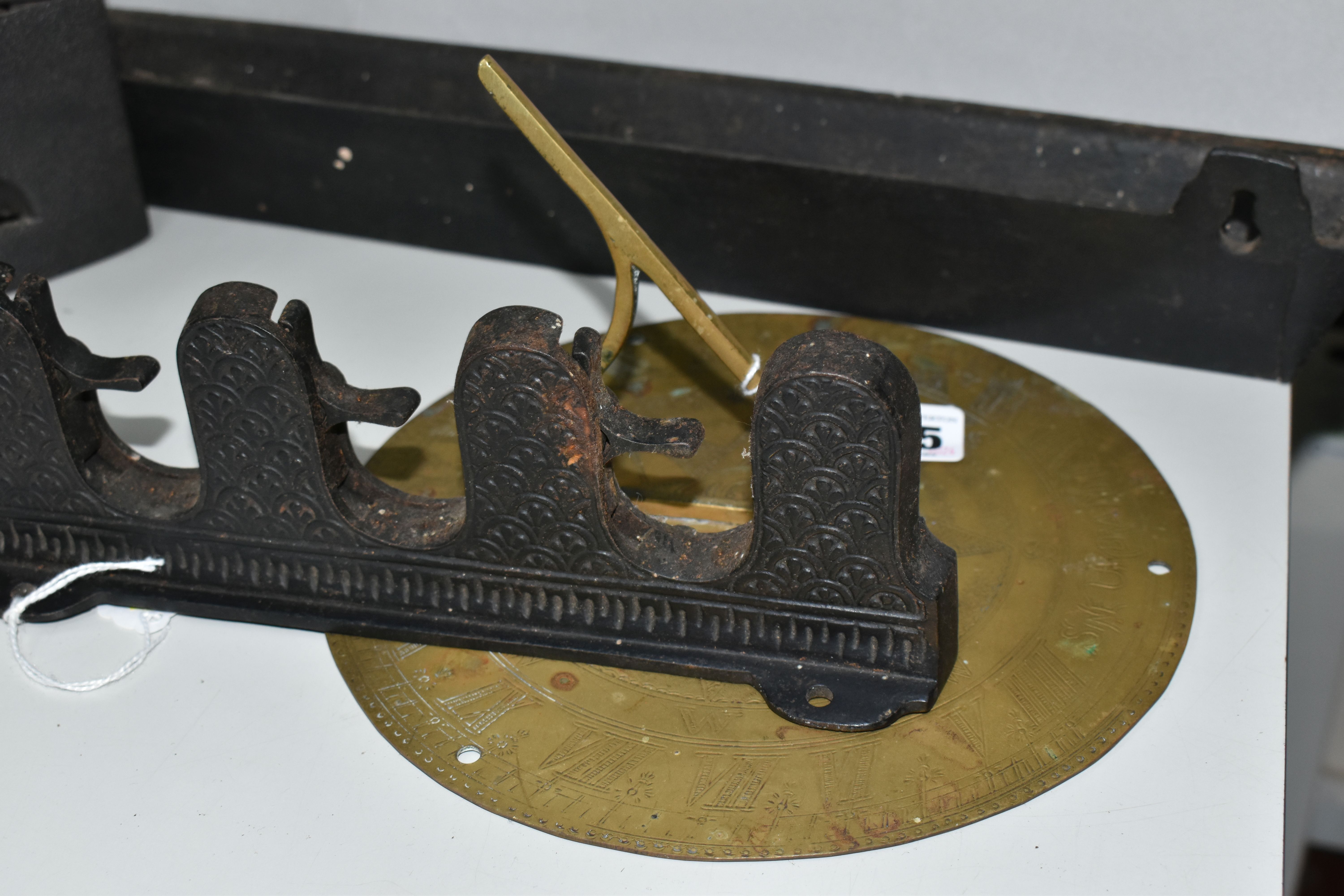 A GROUP OF METAL ITEMS, comprising a brass sundial, diameter approximately 20cm (not quite circular, - Image 4 of 10