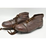 A PAIR OF VINTAGE BROWN LEATHER FOOTBALL BOOTS, marked size 8 to insole, twelve eyelets to each boot