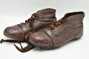 A PAIR OF VINTAGE BROWN LEATHER FOOTBALL BOOTS, marked size 8 to insole, twelve eyelets to each boot