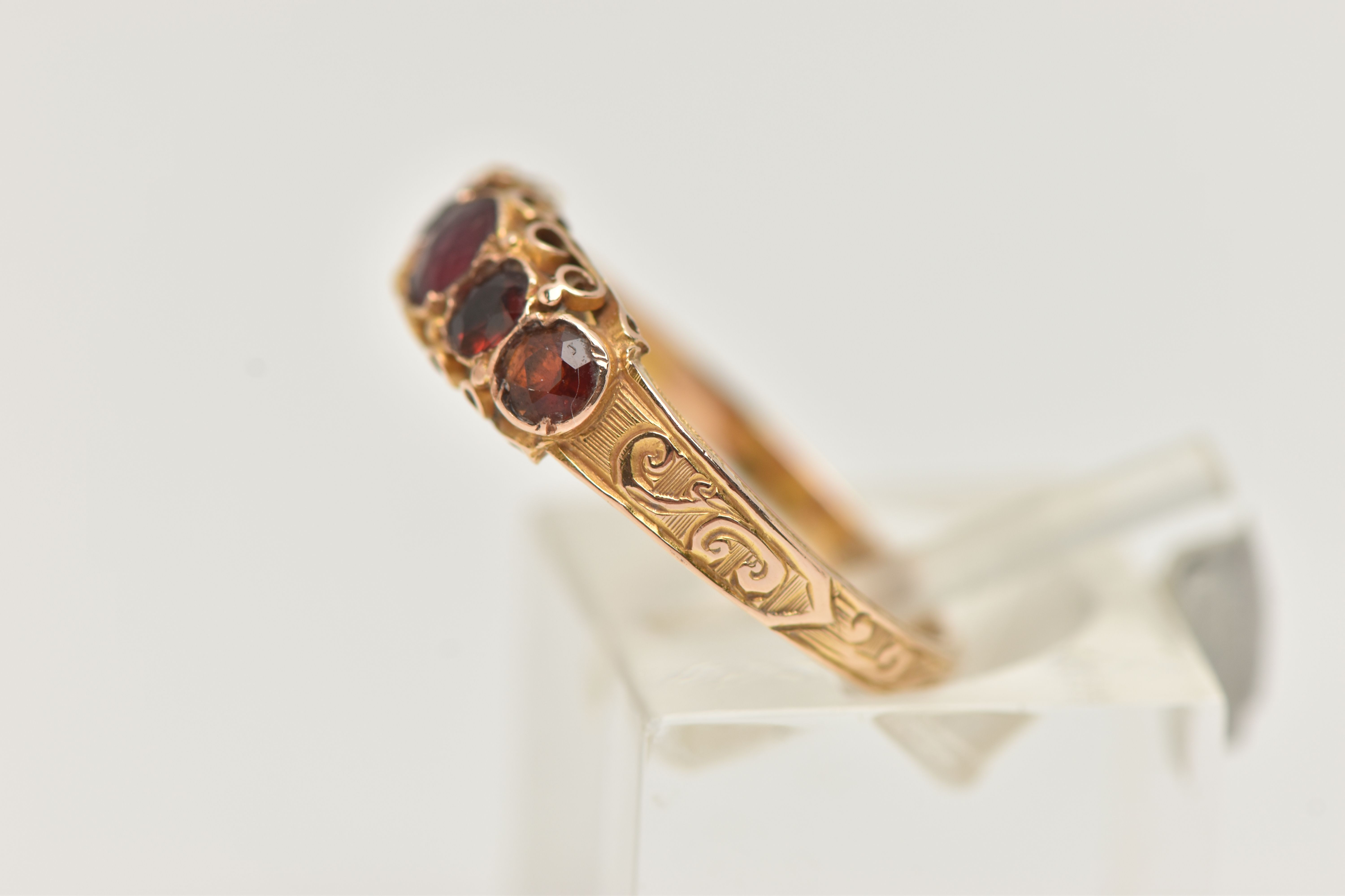 A 15CT GOLD MID VICTORIAN GARNET RING, five circular cut garnets set in yellow gold, scrolling - Image 2 of 4