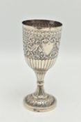A LATE 19TH CENTURY INDIAN WHITE METAL GOBLET, repoussé decorated with foliate scrolls and birds,