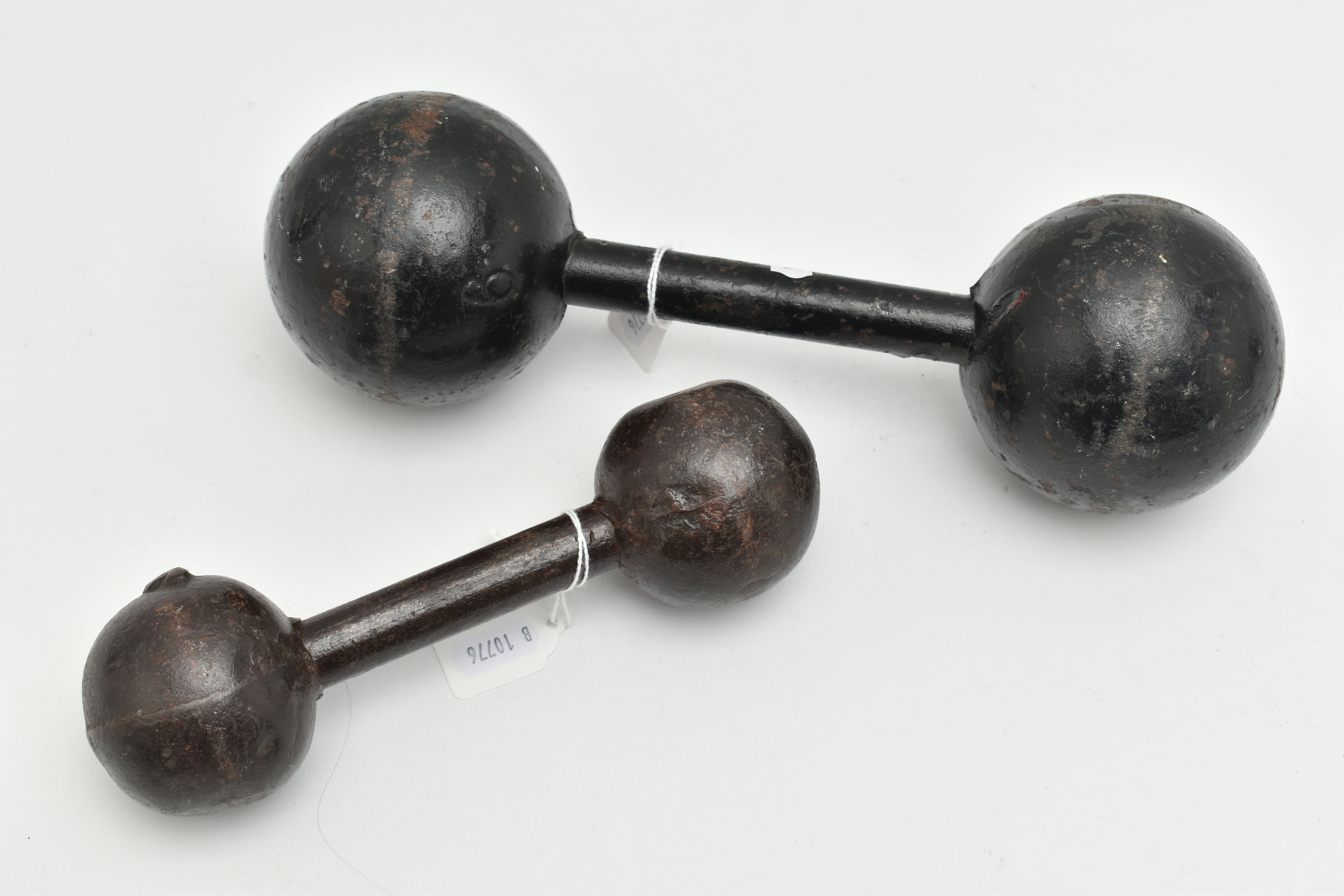 TWO VINTAGE CAST METAL DUMBELLS WITH SPHERICAL ENDS, the larger bears an impressed '6', the - Image 2 of 3
