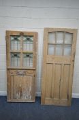 TWO PINE DOORS, the larger one with six glass panes, 81cm x 201cm the smaller one with four lead