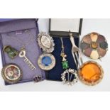 A SMALL ASSORTMENT OF ITEMS, to include a boxed gold plated pendant with a yellow metal Prince of