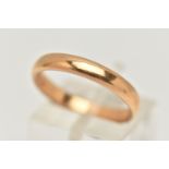 A YELLOW METAL BAND RING, polished band, unmarked, ring size N 1/2, approximate gross weight 4.8
