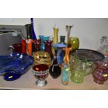 A SELECTION OF DECORATIVE COLOURED GLASSWARES ETC, to include blue and purple pedestal bowls, a tall