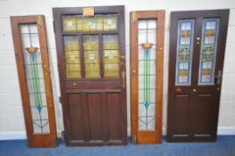 FOUR SIZED INTERNAL DOORS, each with lead glazed stain glass windows, depicting various patterns and