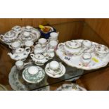 A COLLECTION OF ROYAL CROWN DERBY, WEDGWOOD AND COALPORT MINIATURE TEA WARE, to include a six