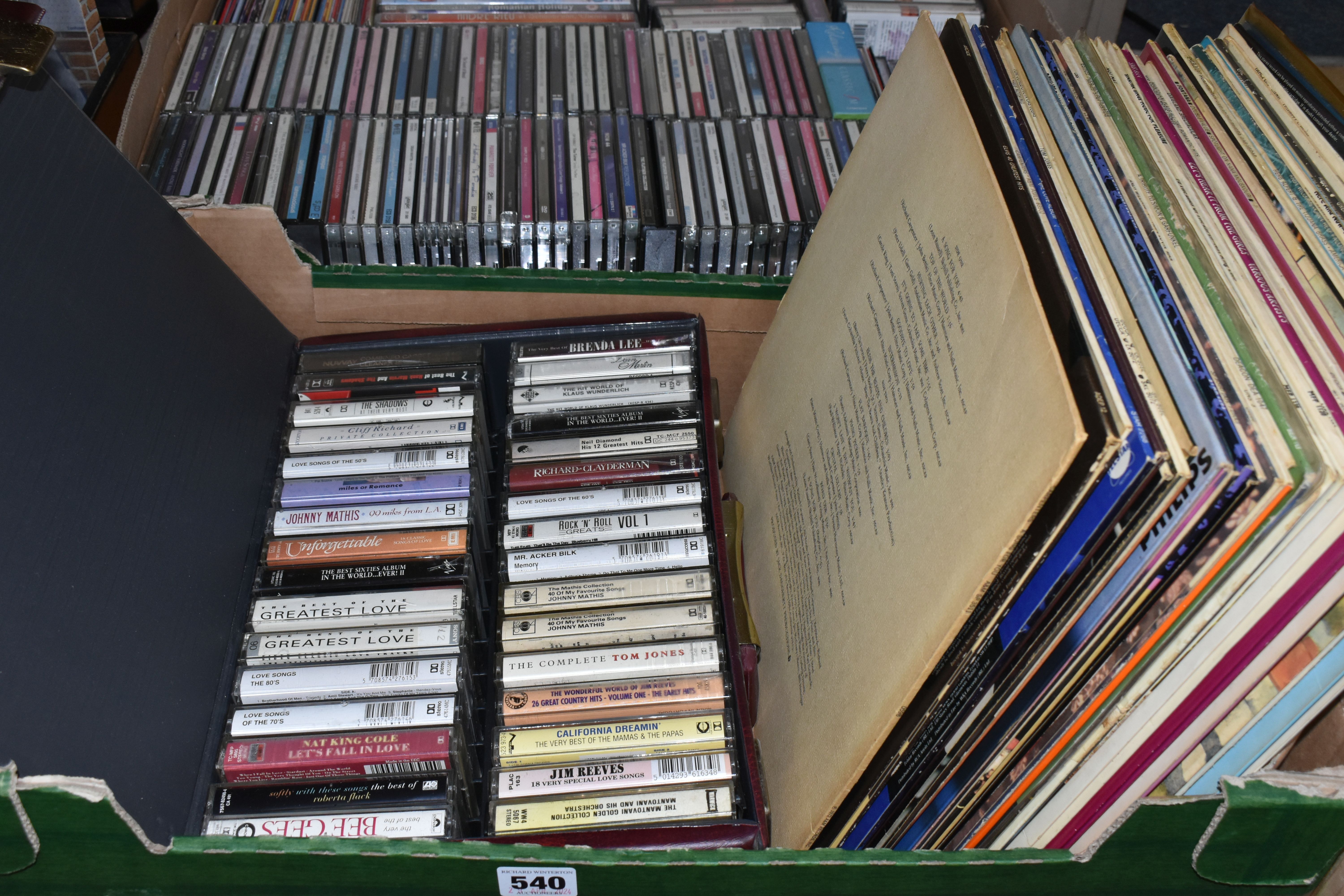 TWO BOXES OF CDS, TAPE CASSETTES AND LP RECORDS, to include over fifty tape cassettes, forty two