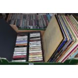 TWO BOXES OF CDS, TAPE CASSETTES AND LP RECORDS, to include over fifty tape cassettes, forty two