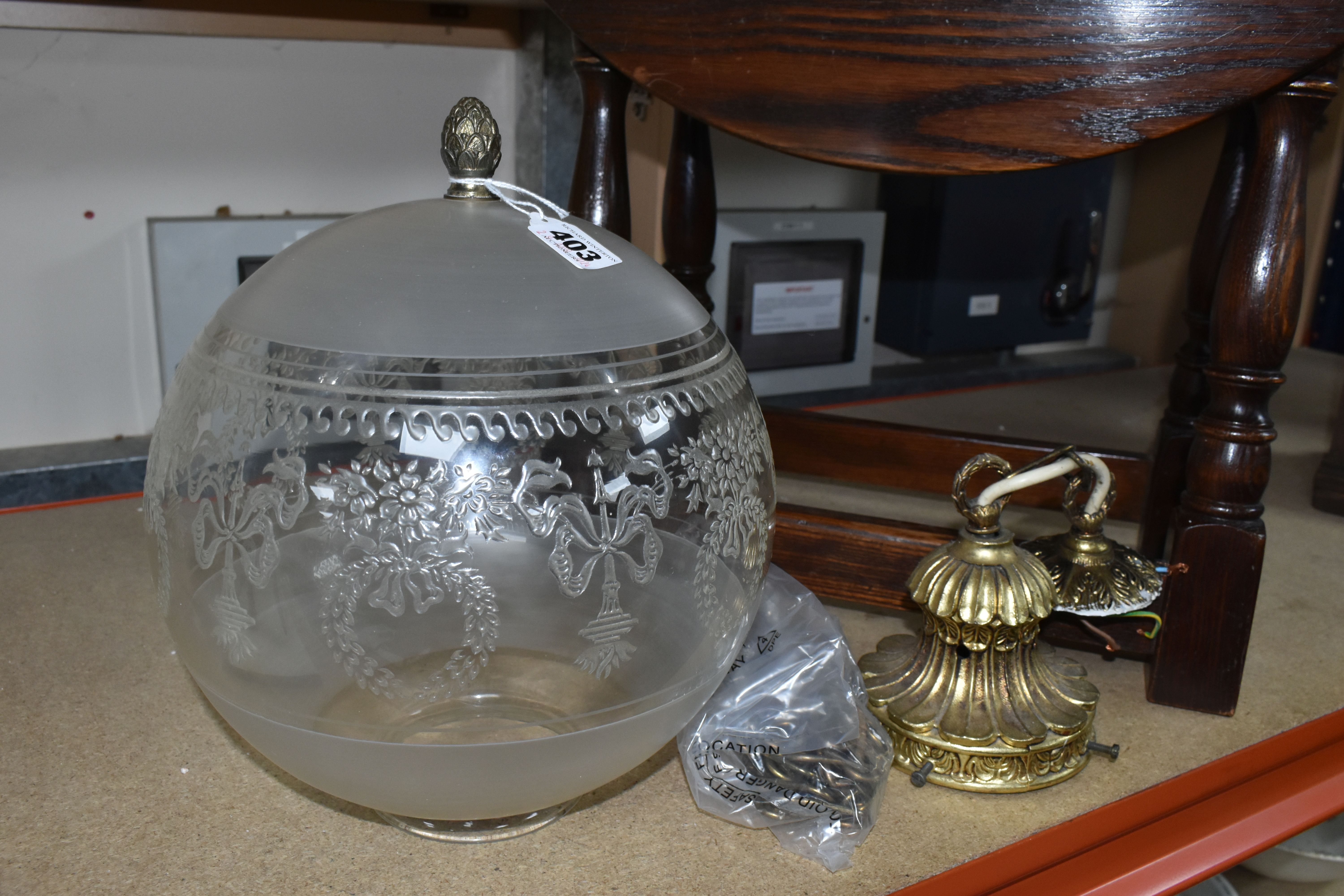 A SMALL DROP LEAF SIDE TABLE AND GLASS LIGHT SHADE, comprising a dark oak dropleaf side table by - Image 2 of 6