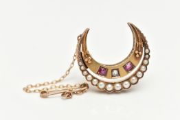 A LATE VICTORIAN SPLIT PEARL, RUBY AND DIAMOND CRESCENT BROOCH, the outer crescent set with