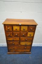 A HARDWOOD CHEST OF FOURTEEN ASSORTED DRAWERS, width 80cm x depth 36cm x height 112cm (condition