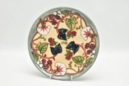 A MOORCROFT POTTERY LIMITED EDITION YEAR PLATE FOR '1998', decorated with Summer's End pattern