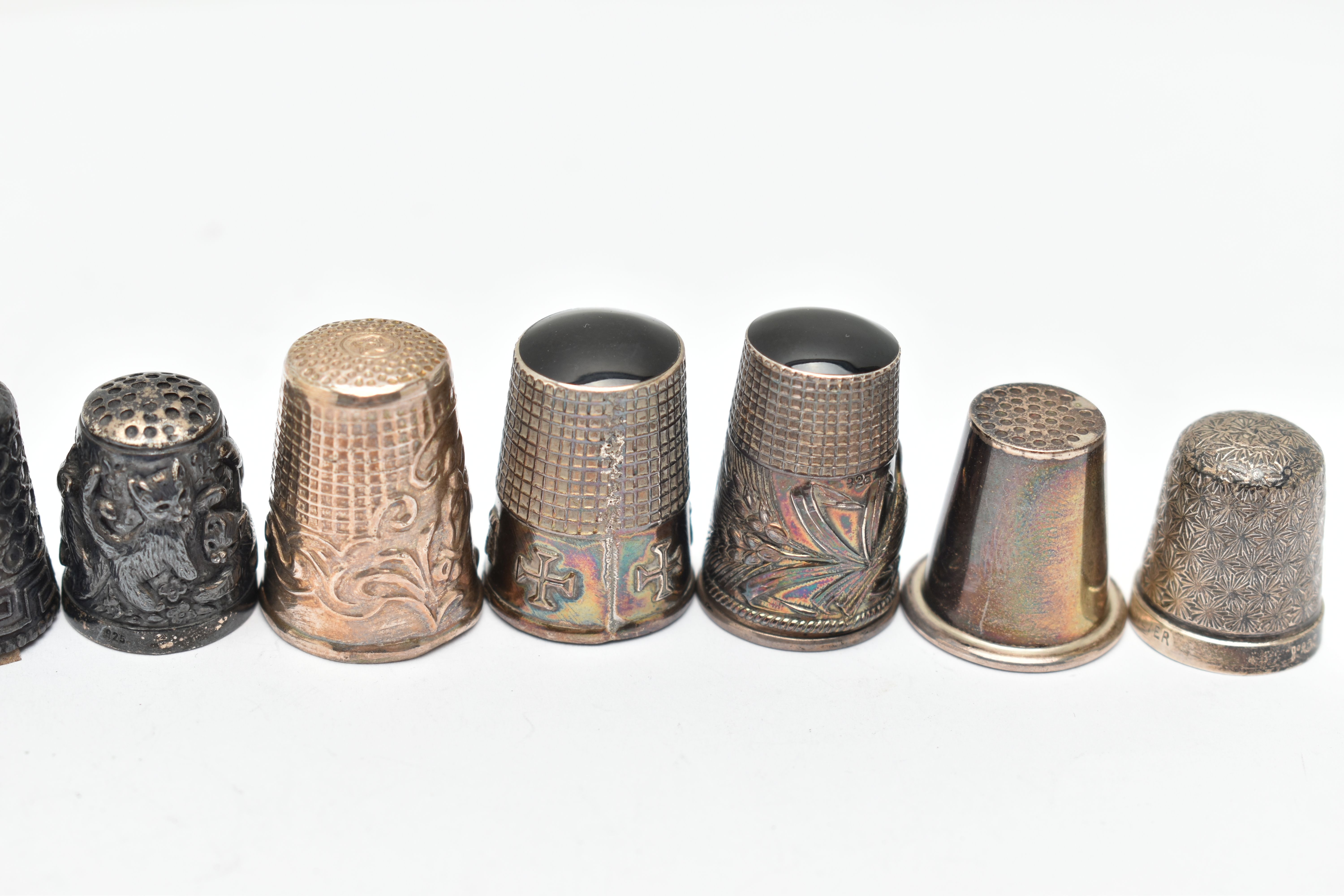 A BAG OF WHITE METAL THIMBLES, various designs and patterns, some set with semi-precious stone - Image 10 of 10