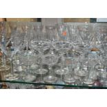 A LARGE QUANTITY OF CHAMPAGNE FLUTES, COUPES AND COCKTAIL GLASSES, comprising three contemporary