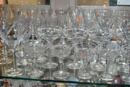 A LARGE QUANTITY OF CHAMPAGNE FLUTES, COUPES AND COCKTAIL GLASSES, comprising three contemporary