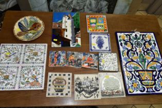 A COLLECTION OF CERAMIC TILES, comprising a Spanish 'Fish' dish marked on the back Valamos, a wall