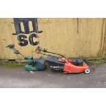 TWO PETROL LAWN MOWERS FOR SPARES OR REPAIRS comprising a Mountfield with grass box (engine pulls