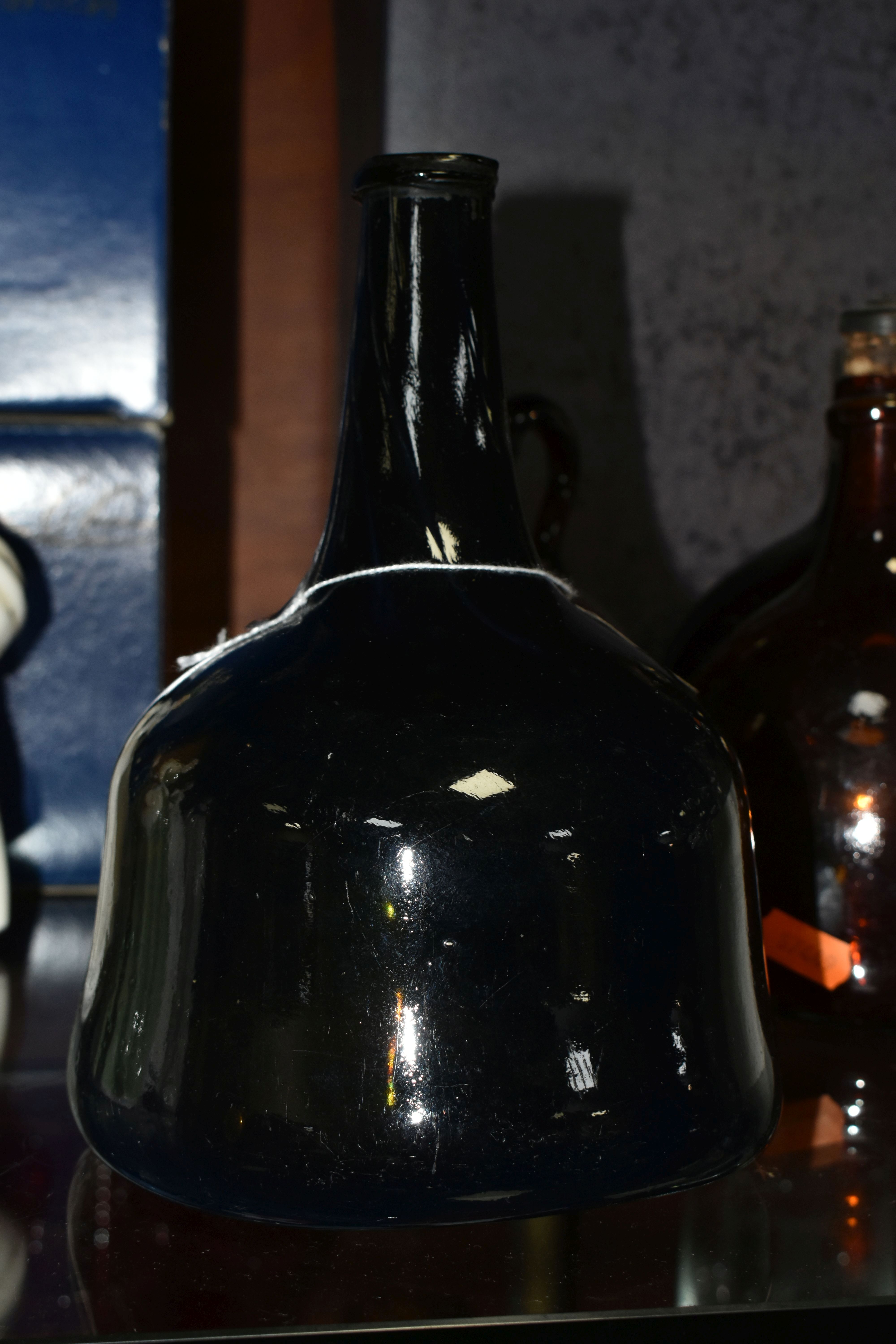 AN 18TH CENTURY MALLET SHAPED AMBER COLOURED BOTTLE, approximate height 21cm, together with three - Image 2 of 9