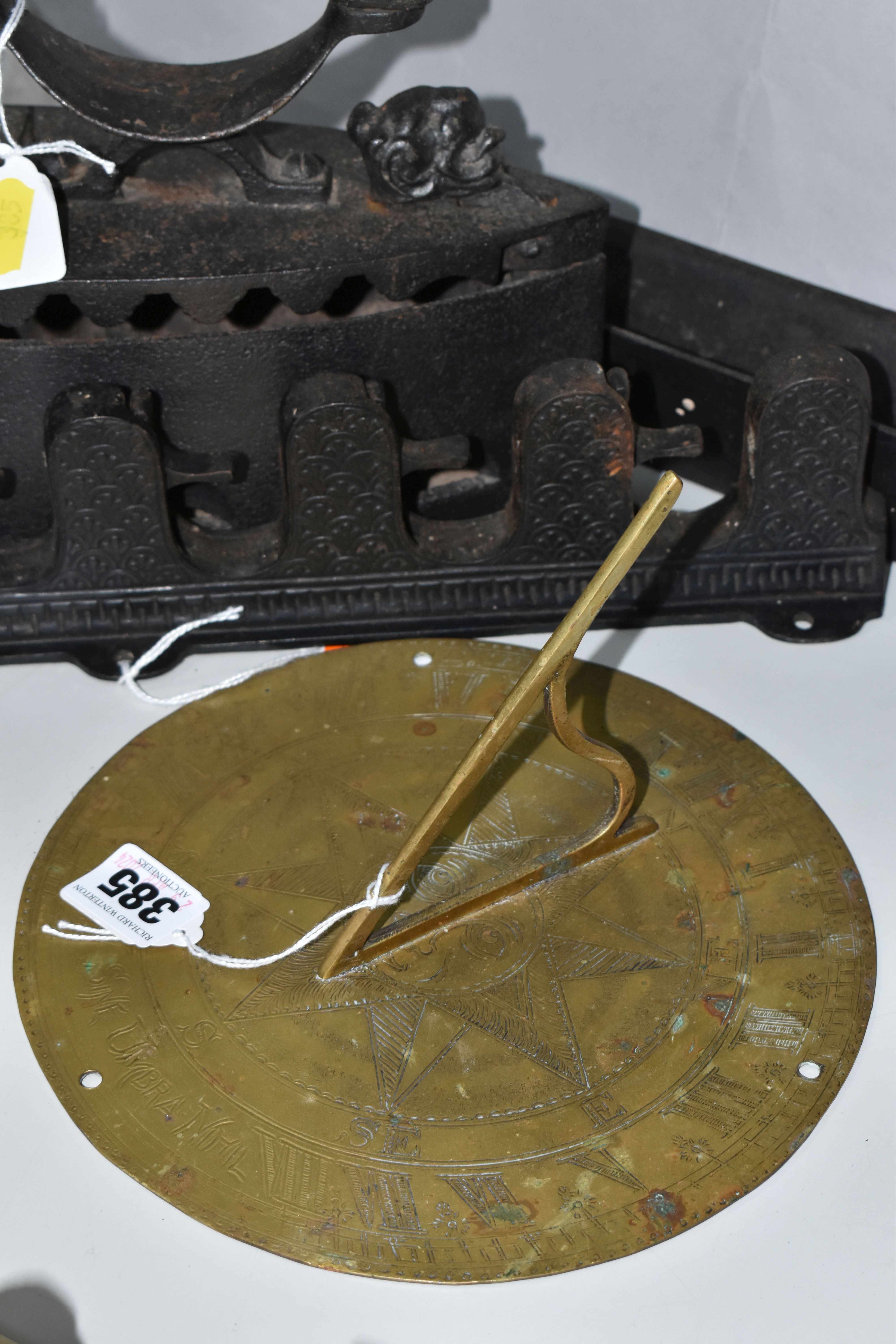 A GROUP OF METAL ITEMS, comprising a brass sundial, diameter approximately 20cm (not quite circular, - Image 6 of 10