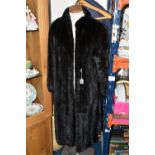 A LADIES' ANKLE LENGTH DARK BROWN FUR COAT, made by Faulkes of Edgbaston, approximate size 12 (1) (