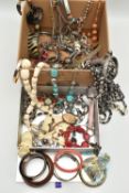 A BOX OF ASSORTED COSTUME JEWELLERY, to include a white metal floral open work brooch, stamped