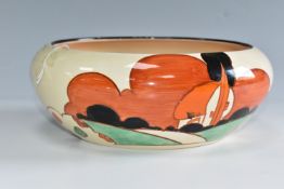 A CLARICE CLIFF BIZARRE BOWL, in Farmhouse pattern, the exterior painted with farmhouses in a