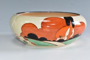 A CLARICE CLIFF BIZARRE BOWL, in Farmhouse pattern, the exterior painted with farmhouses in a