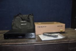 AN OPPO UDP-203 ULTRA HD 4K BLU RAY PLAYER with original packaging, remote, manual and bag (PAT pass