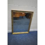 A RECTANGULAR GILT FRAMED BEVELLED EDGE WALL MIRROR, 114cm x 87cm (condition report: some small